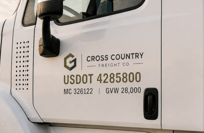 USDOT, MC, and GVW truck decals applied to a Cross Country Freight Co. semi-truck cab